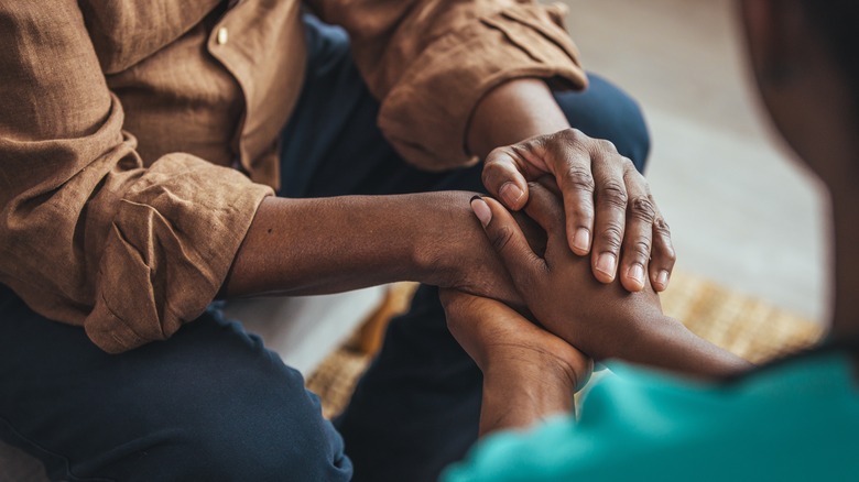 couple holding hands