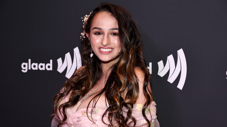 Jazz Jennings posing on GLAAD step-and-repeat