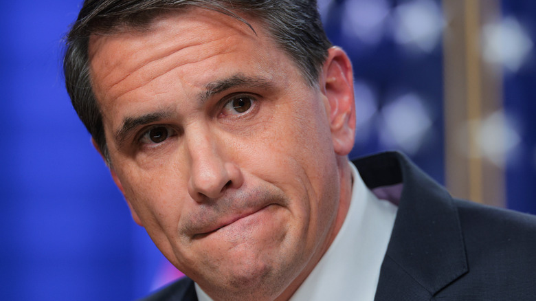 Todd Blanche pursing his lips