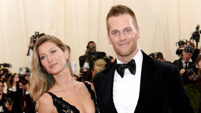 Giselle Bündchen and Tom Brady posing for the camera