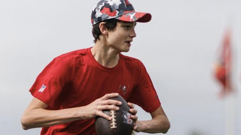 Jack Brady playing football