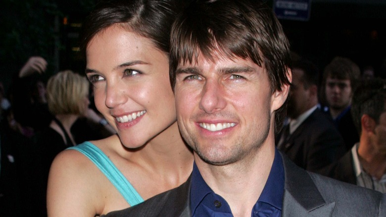 Katie Holmes and Tom Cruise smiling