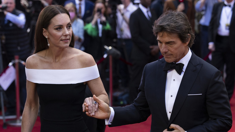 Tom Cruise and Kate Middleton photographed at the "Top Gun: Maverick" Royal Film Performance on May 19, 2022