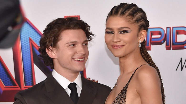 Tom Holland and Zendaya smiling