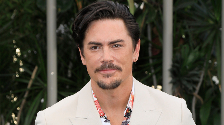 Tom Sandoval smiling at event