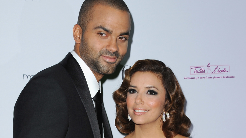 Eva Longoria and Tony Parker pose on red carpet