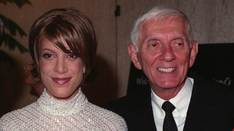 Tori Spelling and father Aaron Spelling smiling