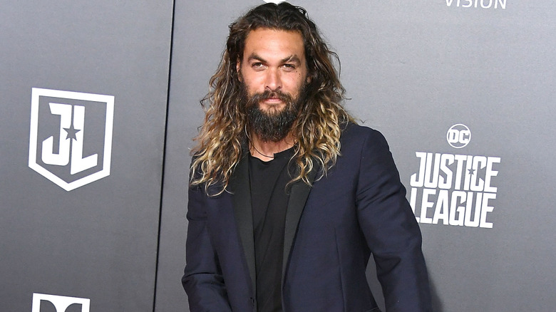 Jason Momoa smiling at the premiere of "Justice League" in 2017