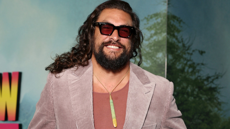 Jason Momoa smiling at a UK screening of "The Wrecking Crew" in 2026