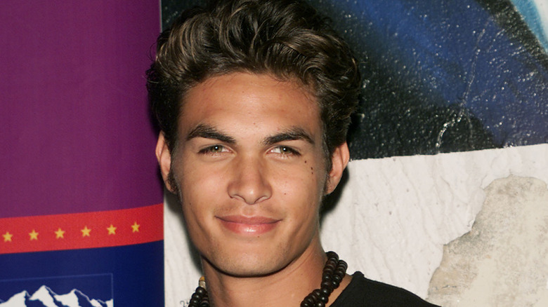 Jason Momoa smiling at the Seventeen Magazine Teen Party in 2000