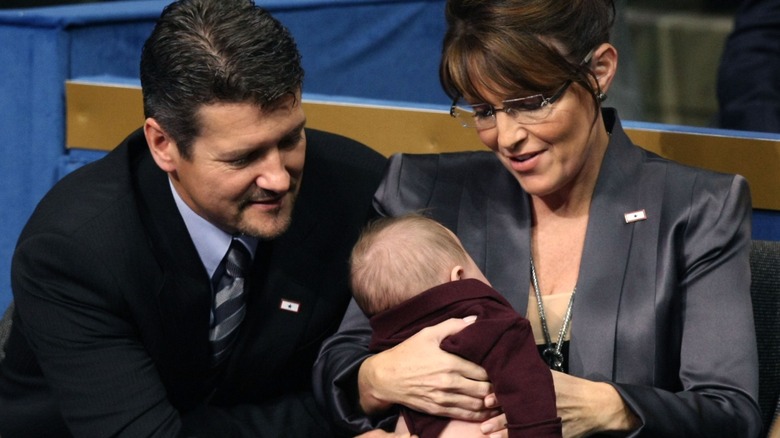Todd and Sarah Palin with their baby Trig Palin in 2008