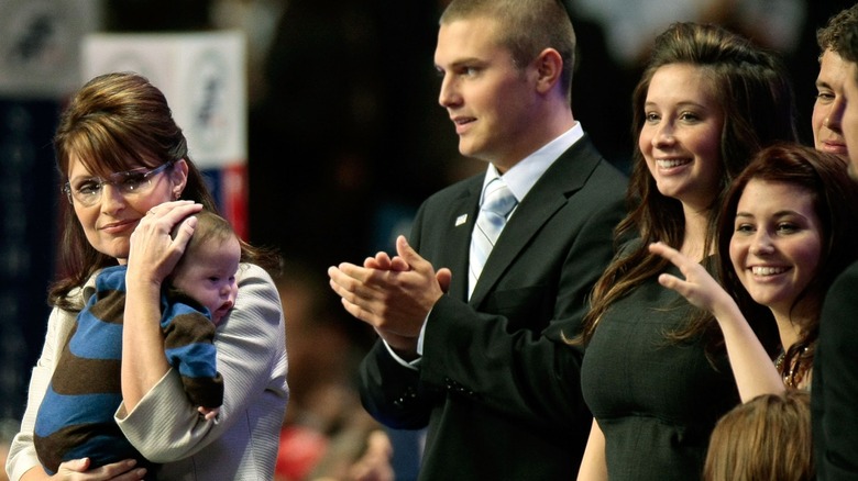 Sarah Palin holding Trig Palin, alongside Track Palin, Bristol Plain, and Willow Palin at the 2008 Republican National Convention
