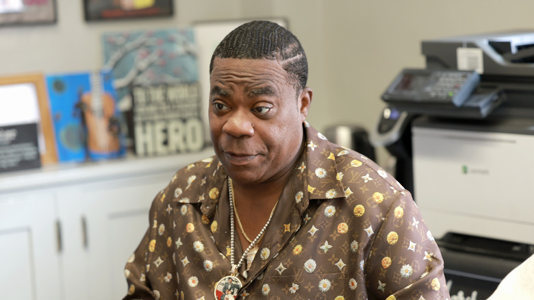 Tracy Morgan in a brown Louis Vuitton shirt