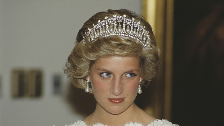 Princess Diana wearing the Lover's Knot tiara with pearl earrings