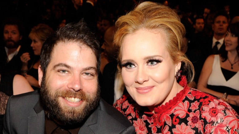 Adele and Simon Konecki seated at the 2013 Grammys smiling