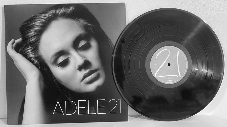 Adele's "21" studio album cover and record on display