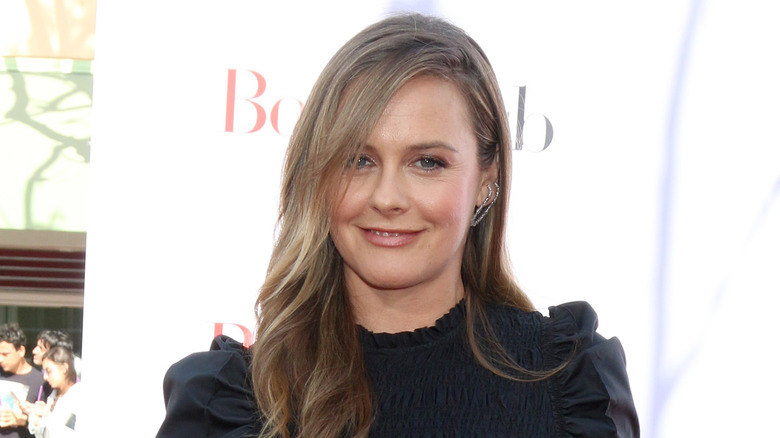 Alicia Silverstone smiling