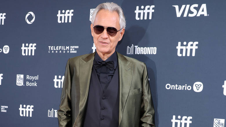 Andrea Bocelli posing on a red carpet