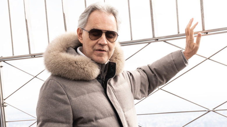 Andrea Bocelli posing at the Empire State Building