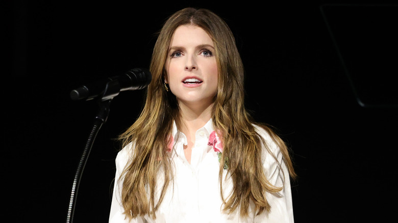 Anna Kendrick speaking onstage at the Academy Museum opening