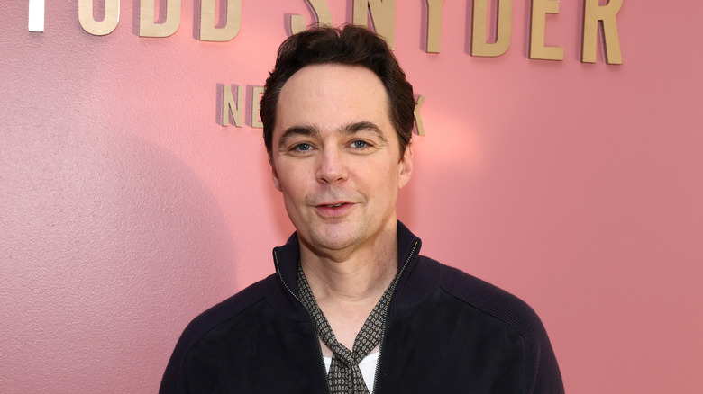 Closeup of Jim Parsons smiling on step-and-repeat