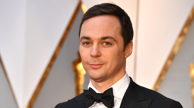 Closeup of Jim Parsons smiling on step-and-repeat