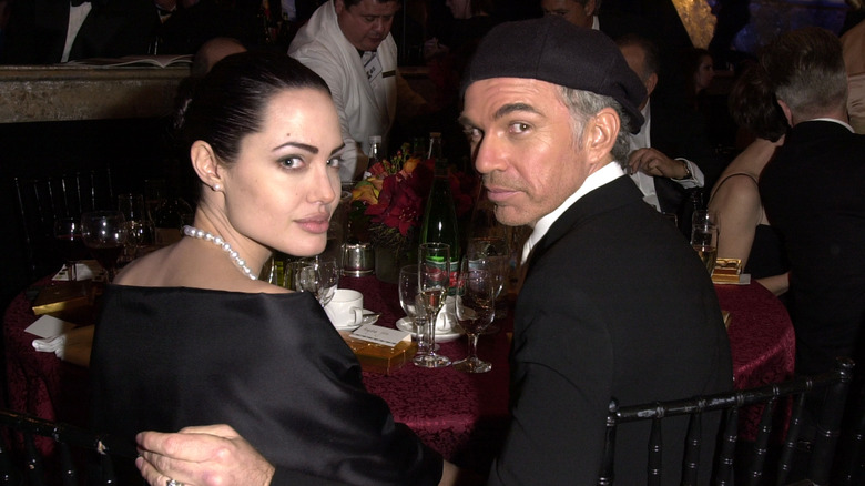 Billy Bob Thornton and Angelina Jolie looking into a camera