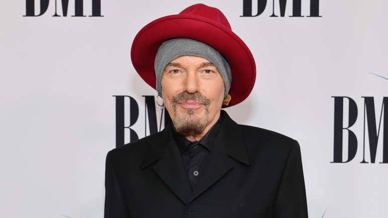 Billy Bob Thornton in a black suit at a festival in 2025