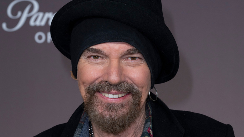 Closeup of Billy Bob Thornton smiling on step-and-repeat