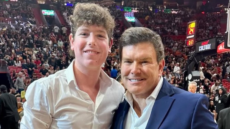 Bret Baier and son Paul attend a basketball game