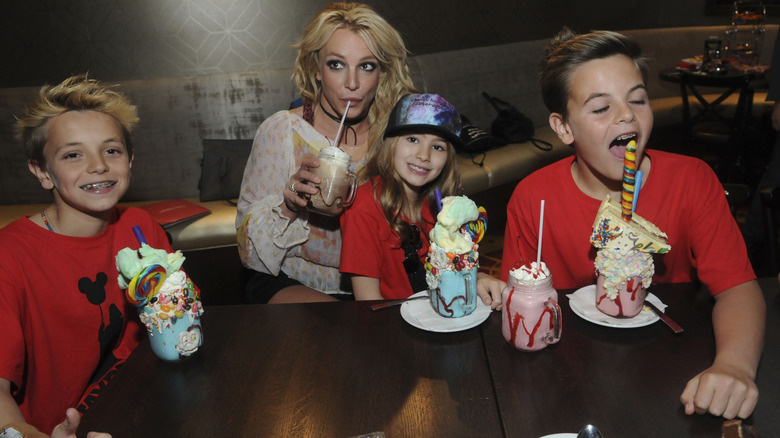 Jayden Federline as a kid on an outing with his mom and brother