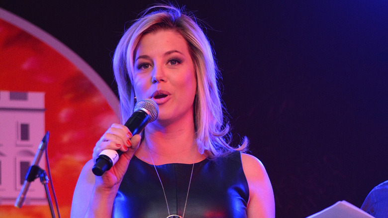 Brianna Keilar speaking into microphone