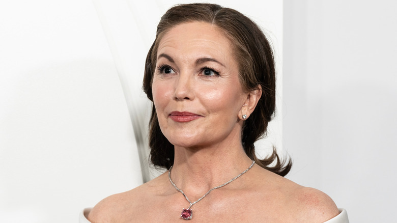 Diane Lane posing on a red carpet
