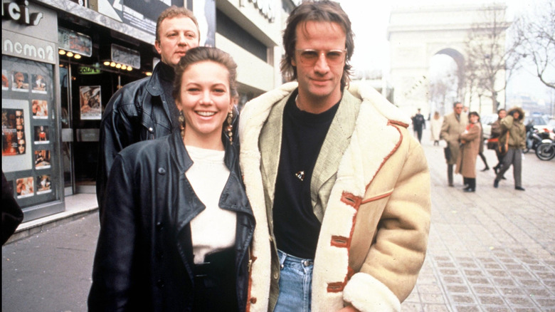 Diane Lane and Christopher Lambert outside