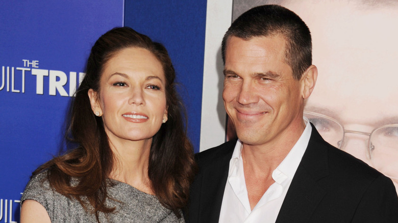 Josh Brolin and Diane Lane smiling on a red carpet