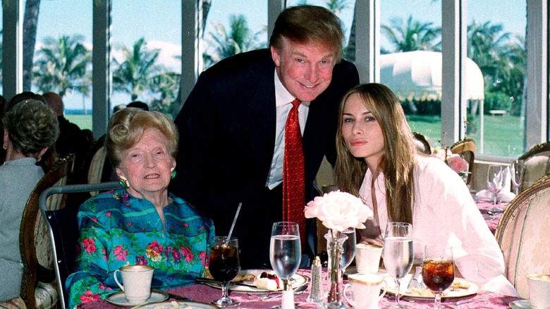 Mary Anne MacLeod Trump after she was mugged, with Donald Trump and Melania Trump in 2000