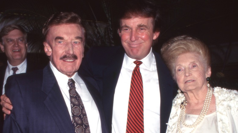 Fred Trump Sr., Donald Trump, and Mary Anne MacLeod Trump at an event.