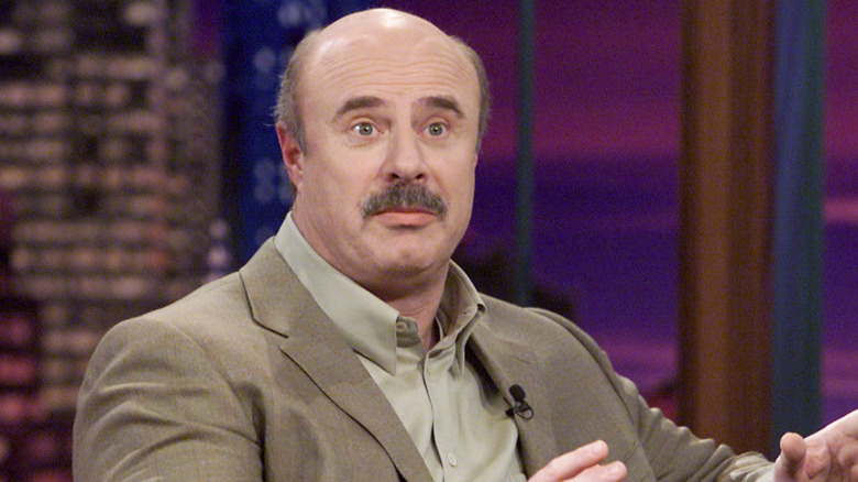 Phil McGraw in tan suit