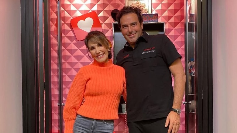 Robin McGraw posing with Dr. Marc Dauer
