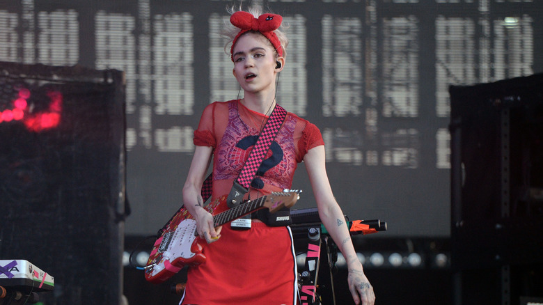 Grimes performing at a concert