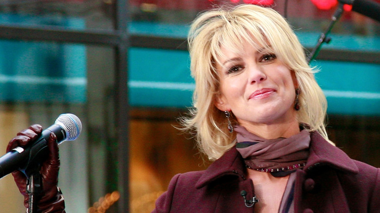 Faith Hill holding a mic onstage