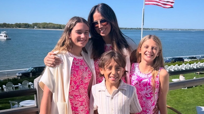 Julie Banderas with her children