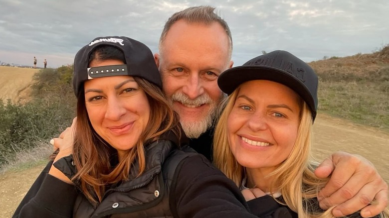Dave Coulier, his wife, and Candace Cameron Bure smile for a selfie