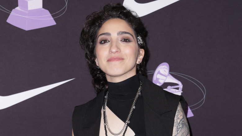 Emily Estefan posing for photos in a black outfit