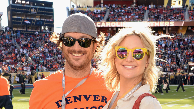 Kate Hudson and Oliver Hudson at a baseball game
