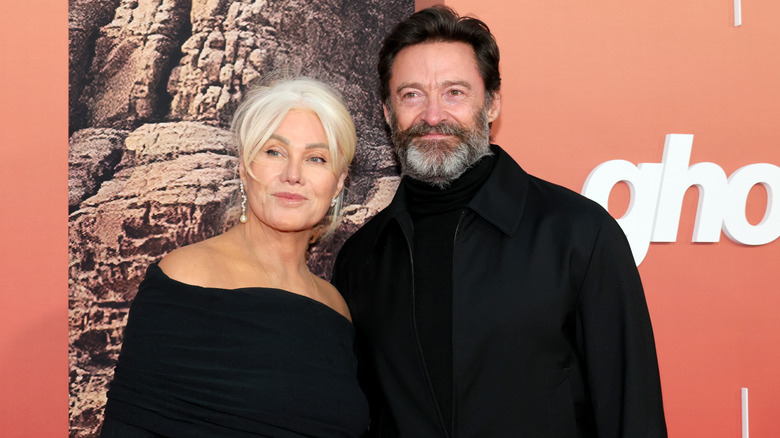 Hugh Jackman and Deborra-Lee Furness posing for photos