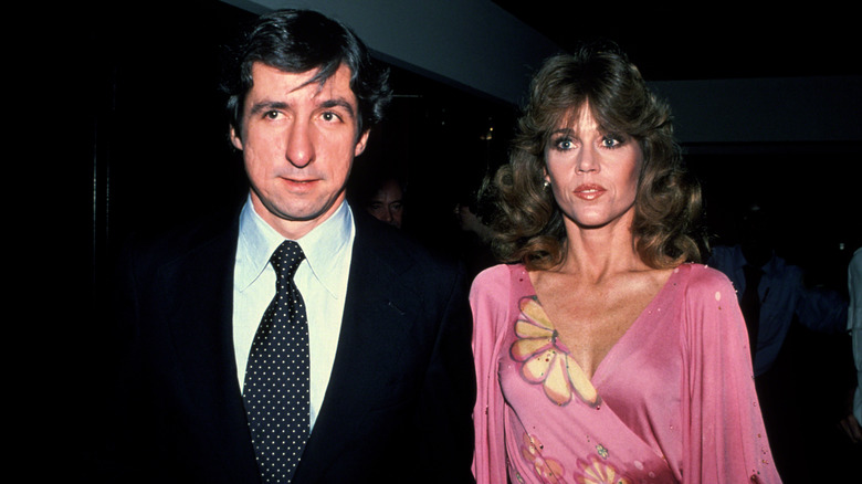 Jane Fonda walking with Tom Hayden