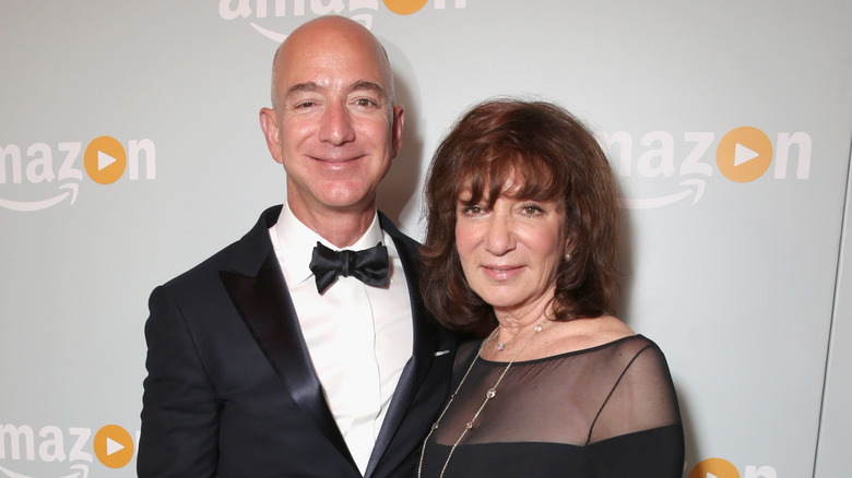 Jeff Bezos and Jacklyn Bezos posing for photos in their finery