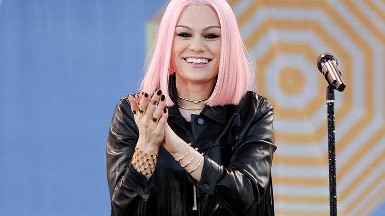 Jessie J with cotton candy pink hair on stage
