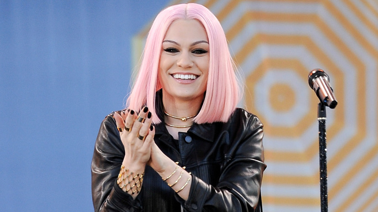 Jessie J with cotton candy pink hair on stage